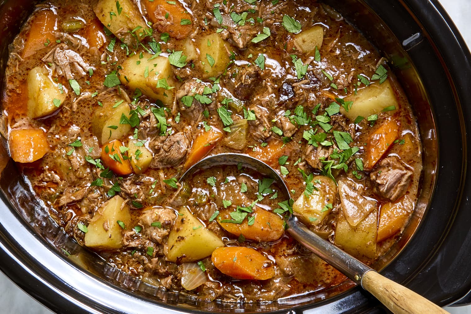 Slow cooker beef and potato casserole serving