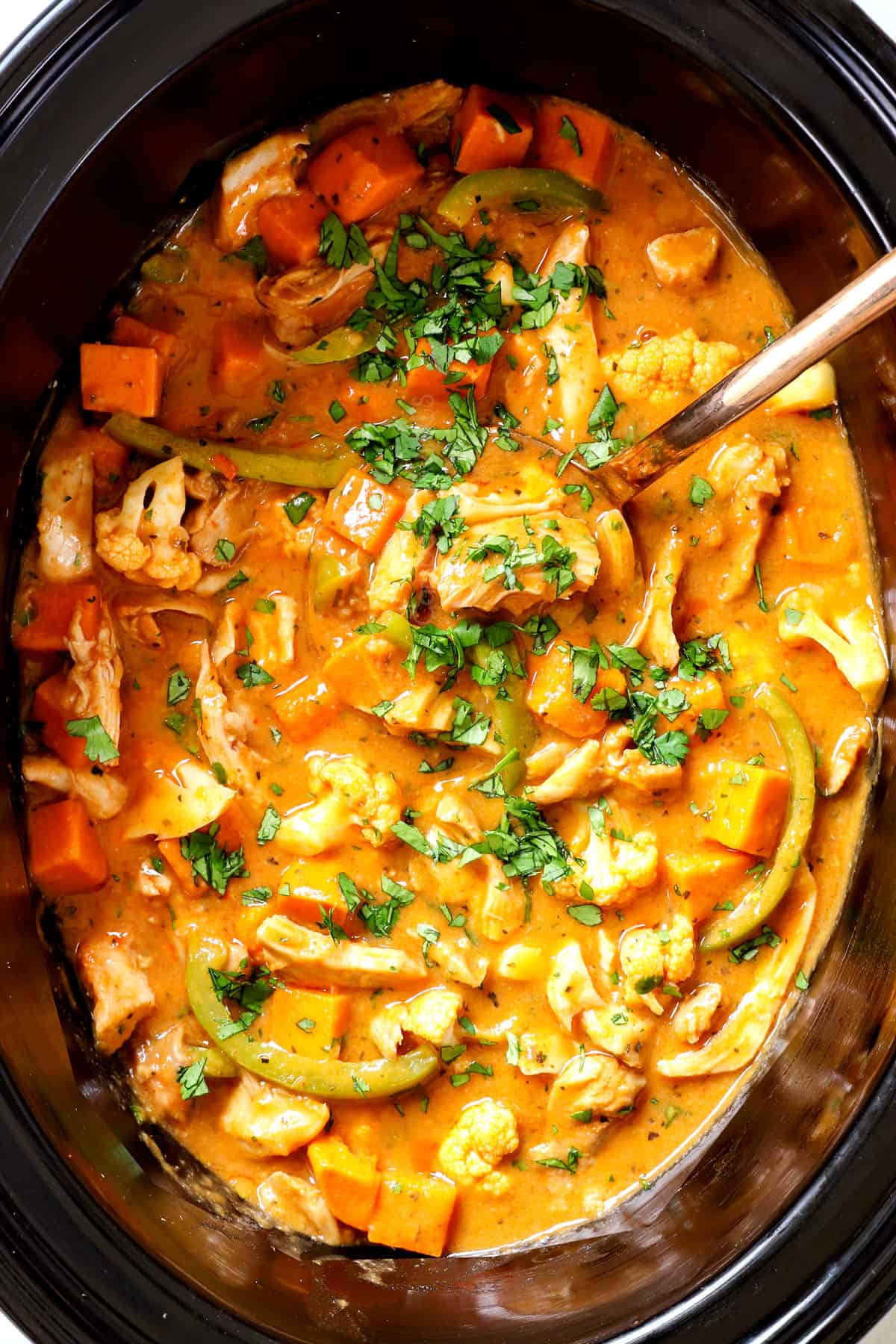 Crockpot Coconut Curry Chicken cooking in slow cooker
