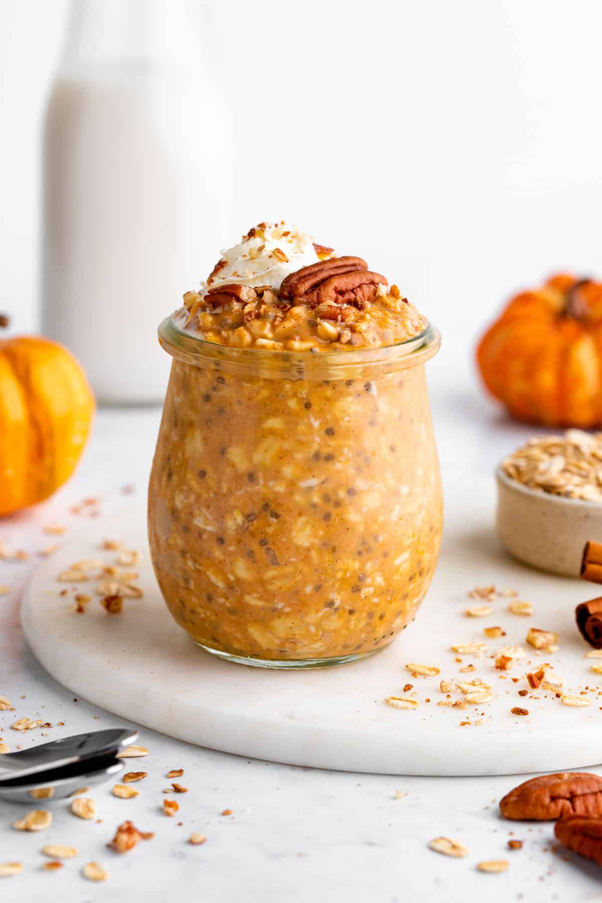 Pumpkin Overnight Oats with a spoon, ready to eat