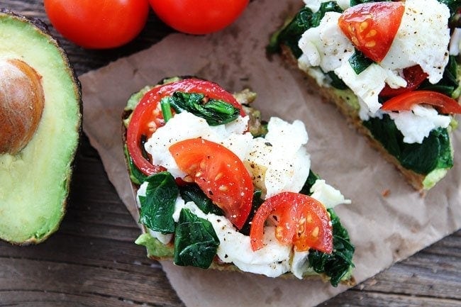 Avocado Toast with Eggs Spinach and Tomatoes